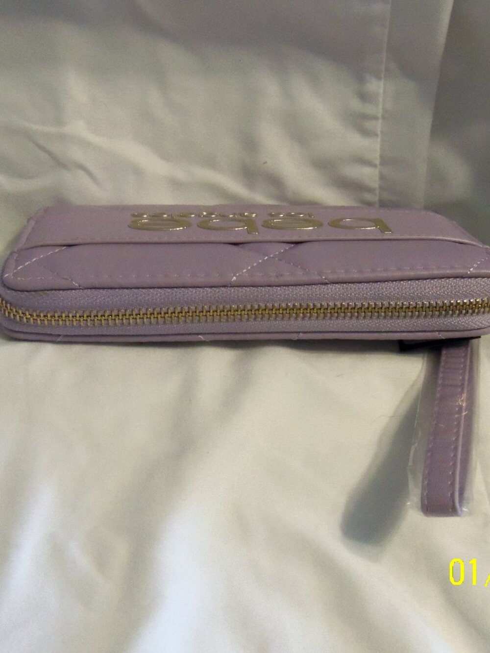 BeBe Zip Around Wrislet Lilac MSRP $49.00